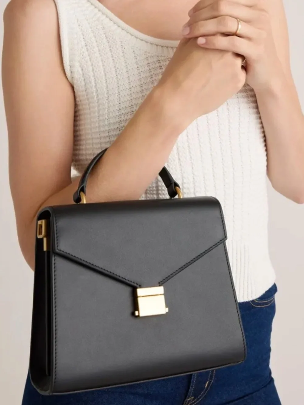 Quince black leather top-handle bag